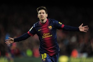(FILES) A picture taken on December 16, 2012 shows Barcelona's Argentinian forward Lionel Messi celebrating after scoring a goal during the Spanish league football match FC Barcelona vs Atletico de Madrid at the Camp Nou stadium in Barcelona. Messi has agreed on December 18, 2012 to renew his contract with FC Barcelona until June 2018.AFP PHOTO / LLUIS GENE        (Photo credit should read LLUIS GENE/AFP/Getty Images)